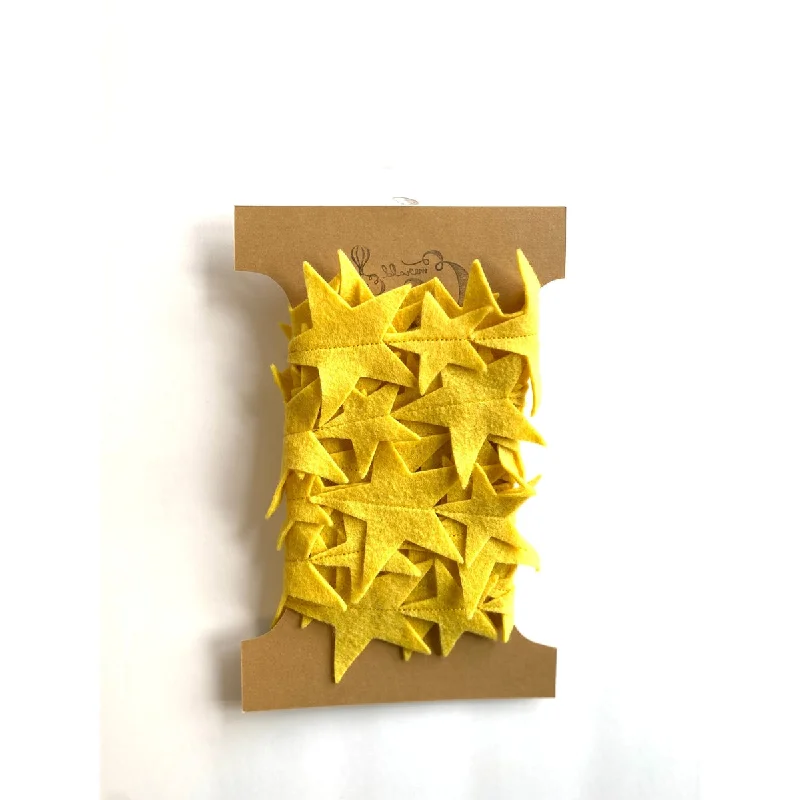 - Teething and chewing toys for puppiesEmerald & Ginger yellow star garland